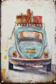 MAN CAVE.￼ Volkswagen beetle with luggage rack on top