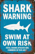 Shark warning, swim at your own risk