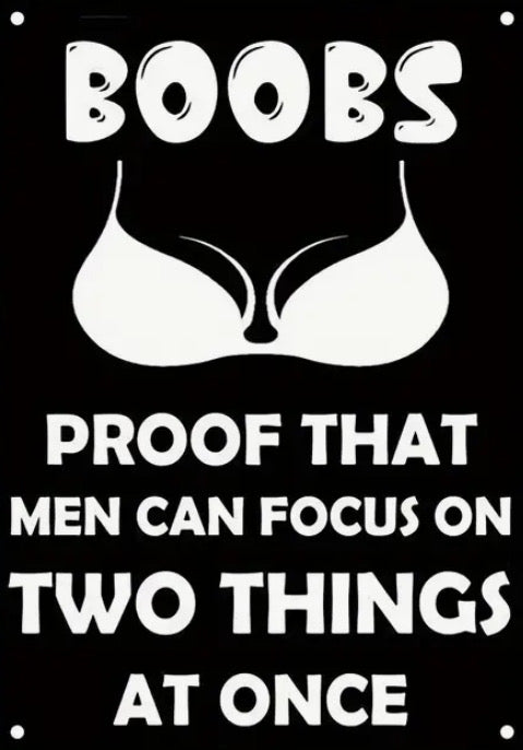 Boobs proof that man can focus on two things at once