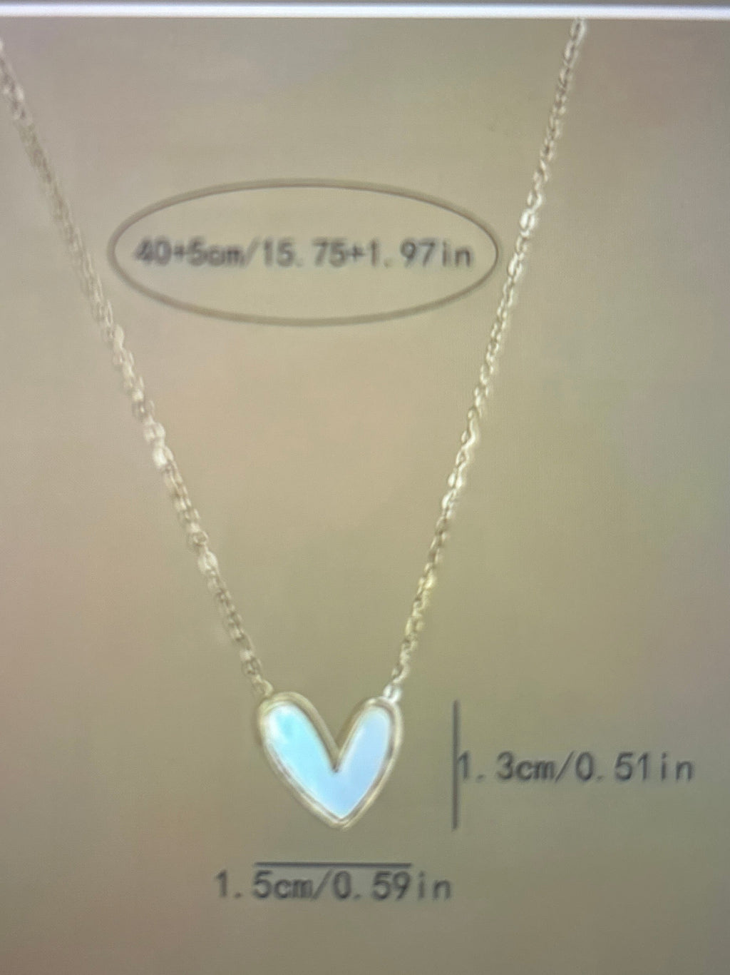 Heart shaped pendant collarbone chain.