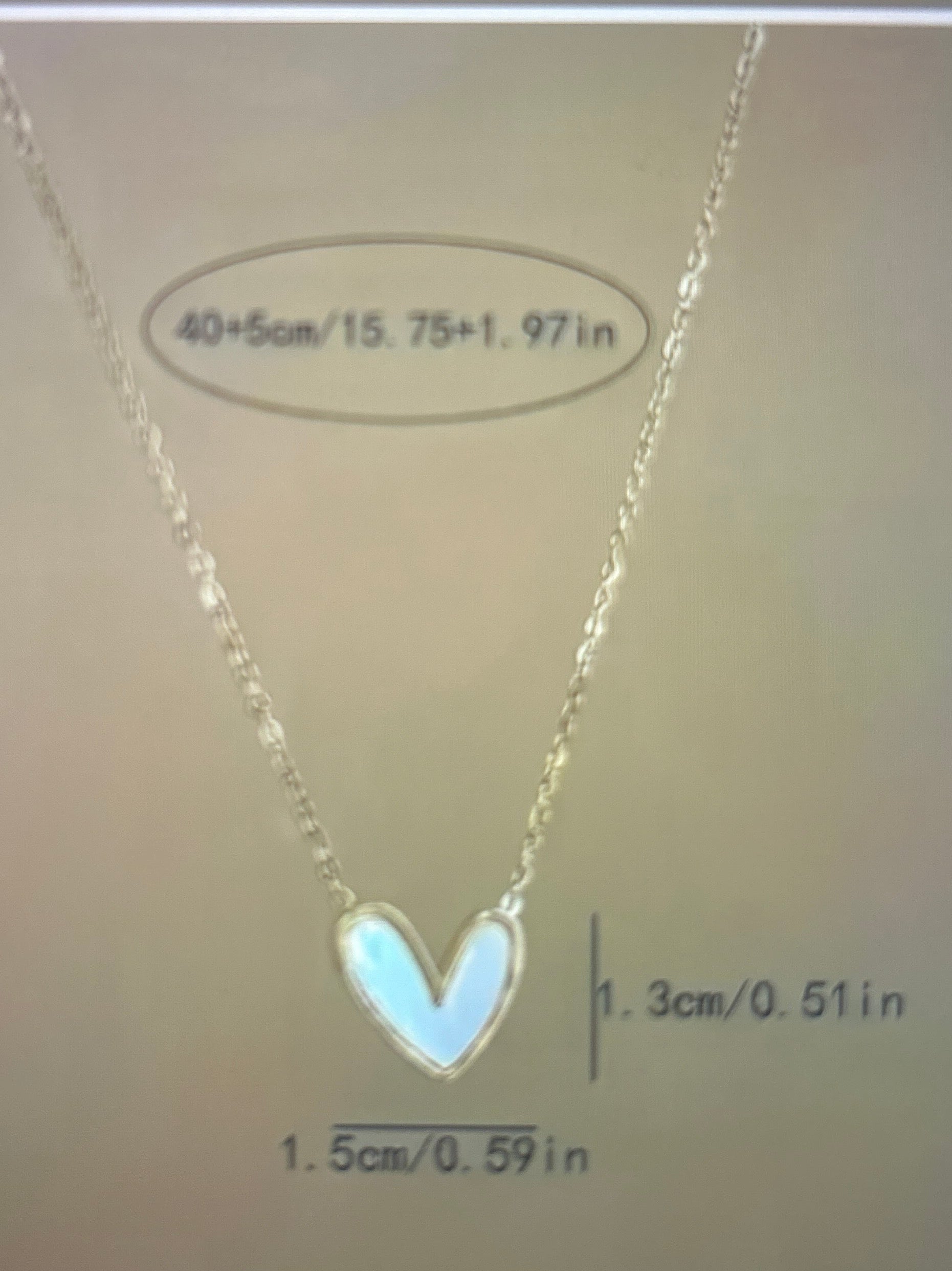 Heart shaped pendant collarbone chain.